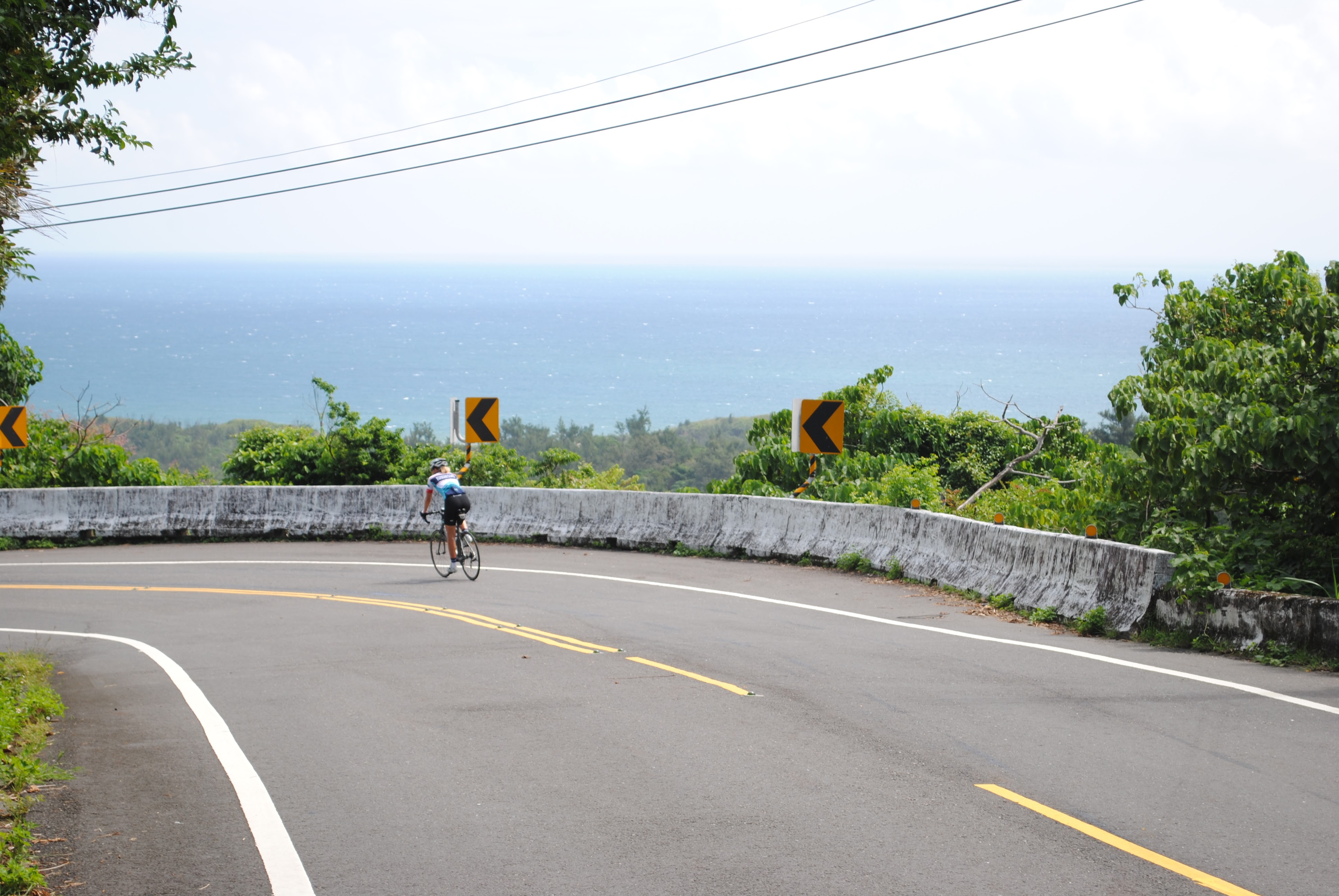 Cyclist on coastal road
