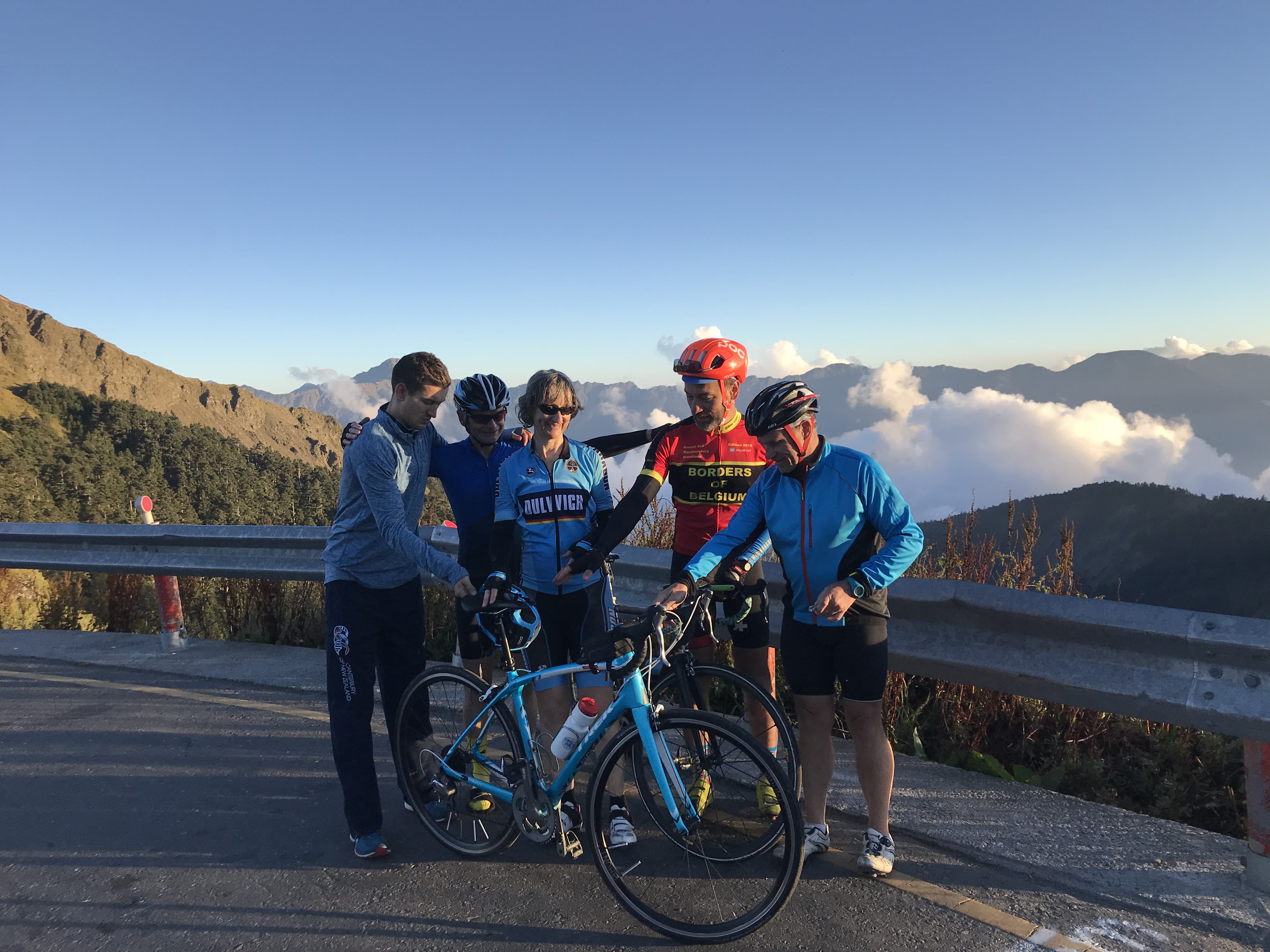 Group portrait at high-altitude mountain overlook